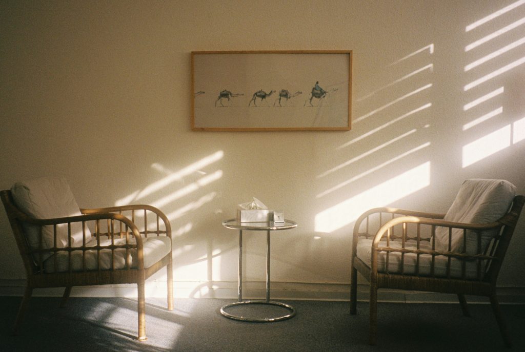 Therapy room with two empty chairs